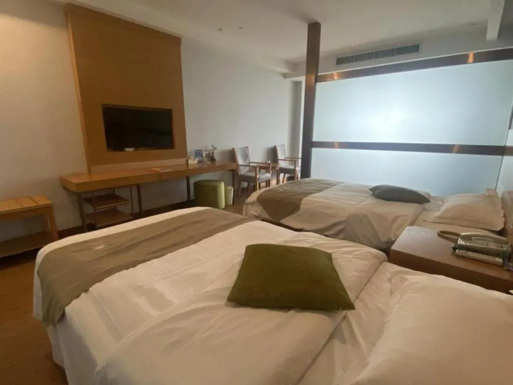 Bed in GreenTree Inn Ningbo Hangzhou Wan New District Lishi Square Business Hotel
