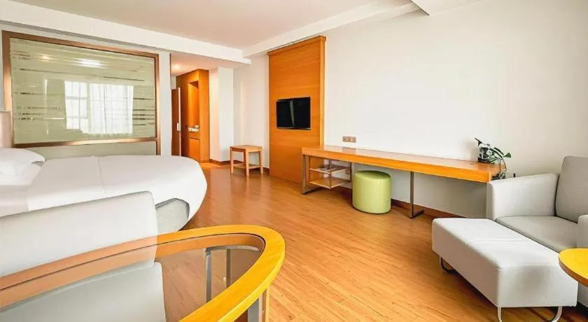 Bed in GreenTree Inn Ningbo Hangzhou Wan New District Lishi Square Business Hotel