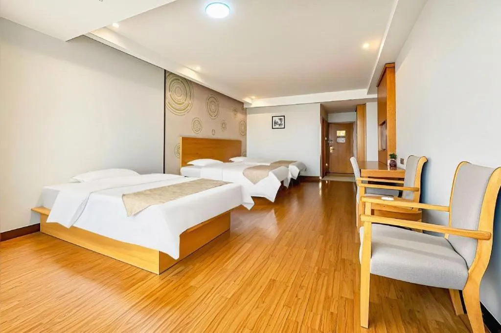 Bed in GreenTree Inn Ningbo Hangzhou Wan New District Lishi Square Business Hotel