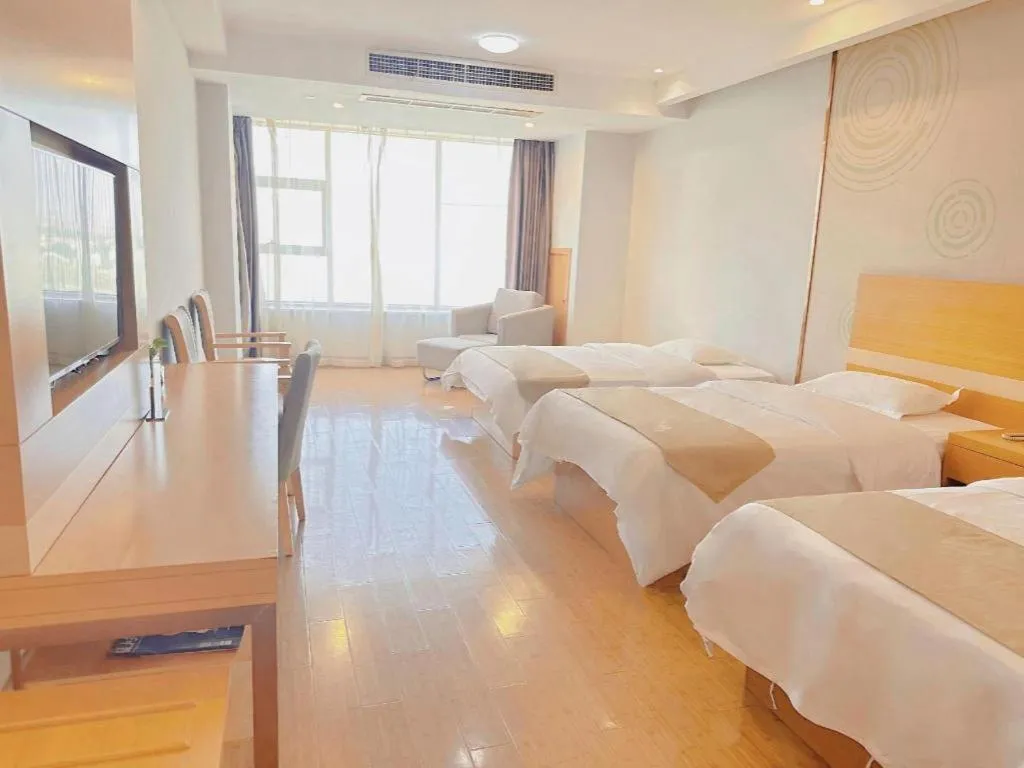 Bed in GreenTree Inn Ningbo Hangzhou Wan New District Lishi Square Business Hotel