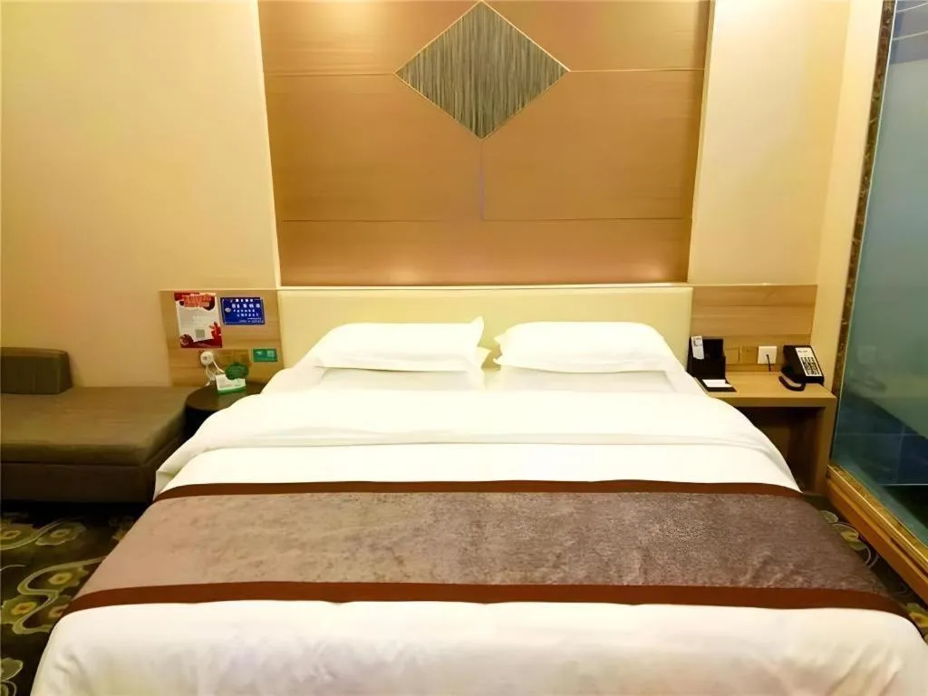 Bed in GreenTree Inn Ningbo Hangzhou Wan New District Lishi Square Business Hotel