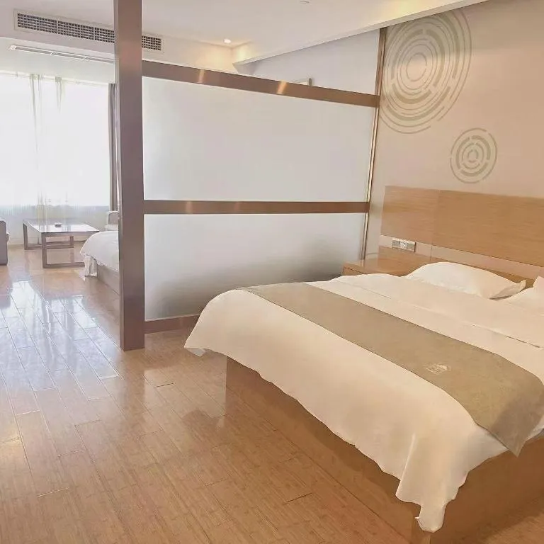 Bed in GreenTree Inn Ningbo Hangzhou Wan New District Lishi Square Business Hotel