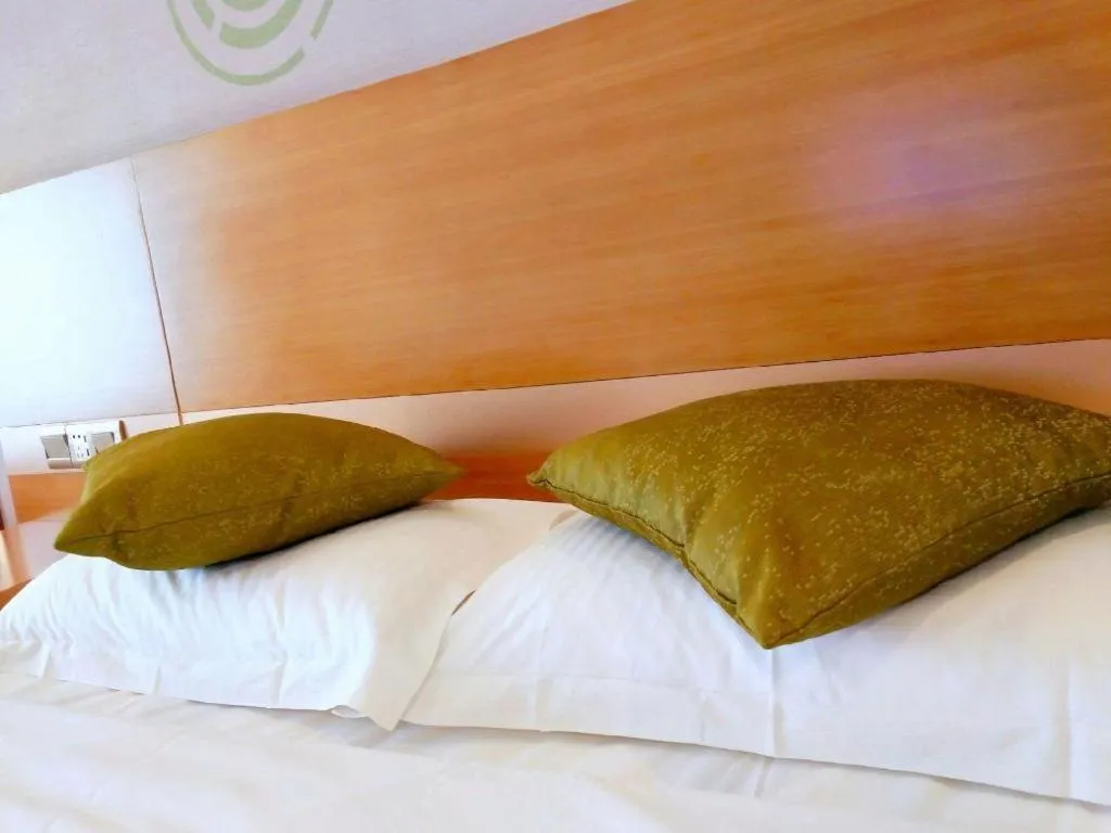 Bed in GreenTree Inn Ningbo Hangzhou Wan New District Lishi Square Business Hotel