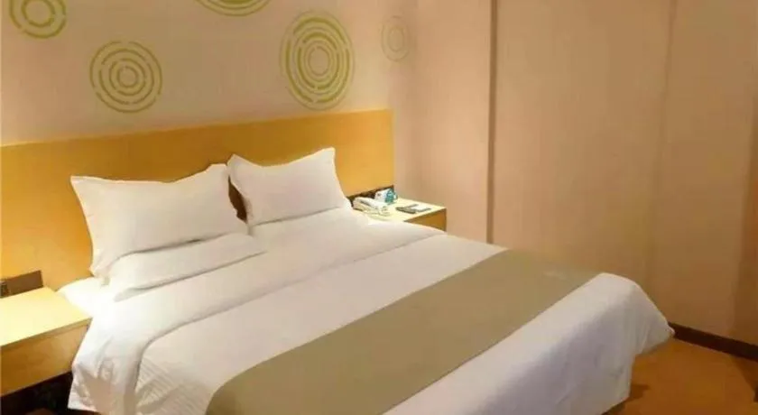 Bed in GreenTree Inn Ningbo Hangzhou Wan New District Lishi Square Business Hotel