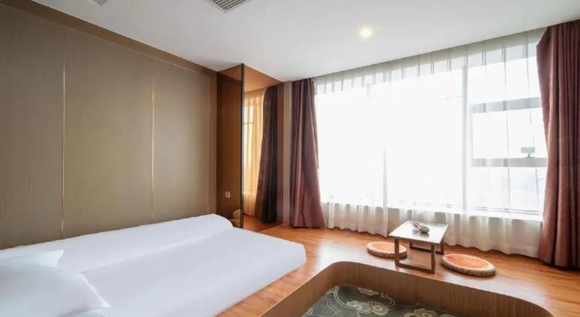 Bed in GreenTree Inn Ningbo Hangzhou Wan New District Lishi Square Business Hotel