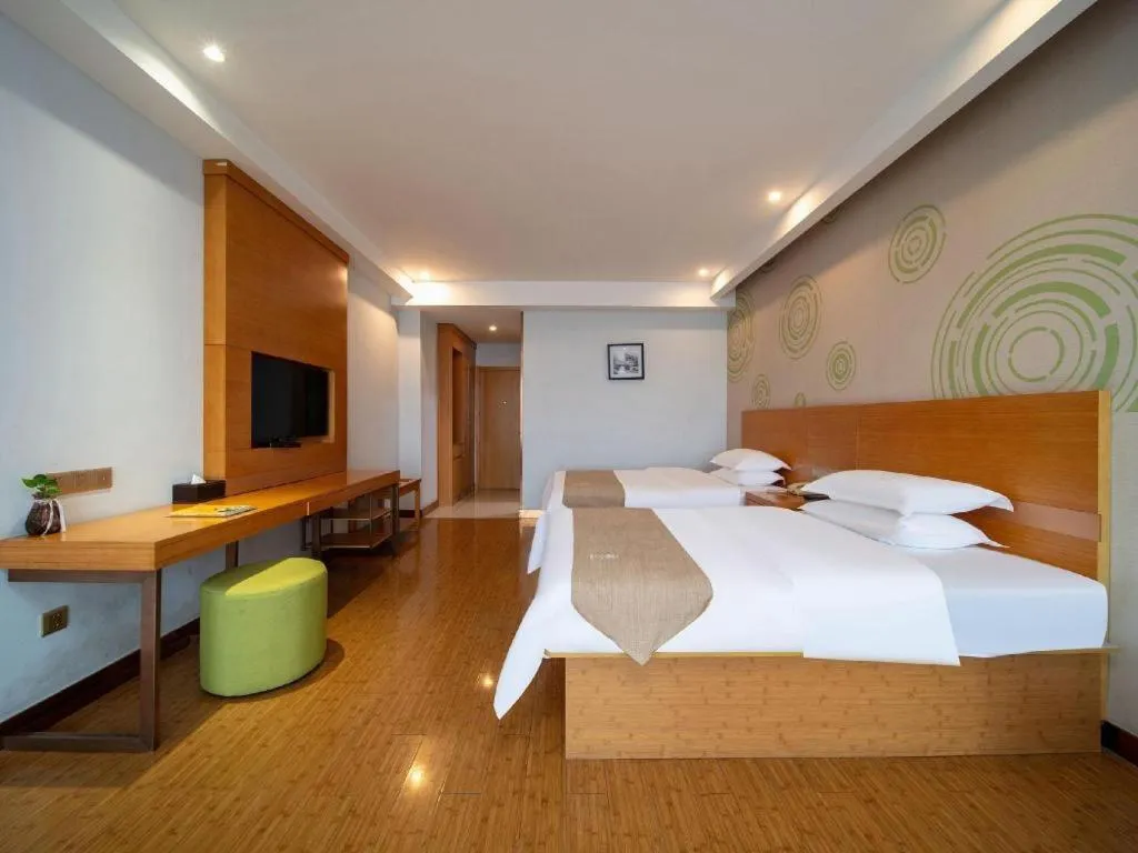 Bed in GreenTree Inn Ningbo Hangzhou Wan New District Lishi Square Business Hotel