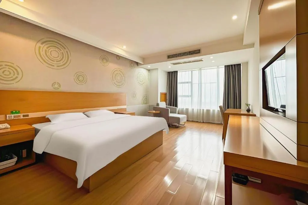 Bed in GreenTree Inn Ningbo Hangzhou Wan New District Lishi Square Business Hotel