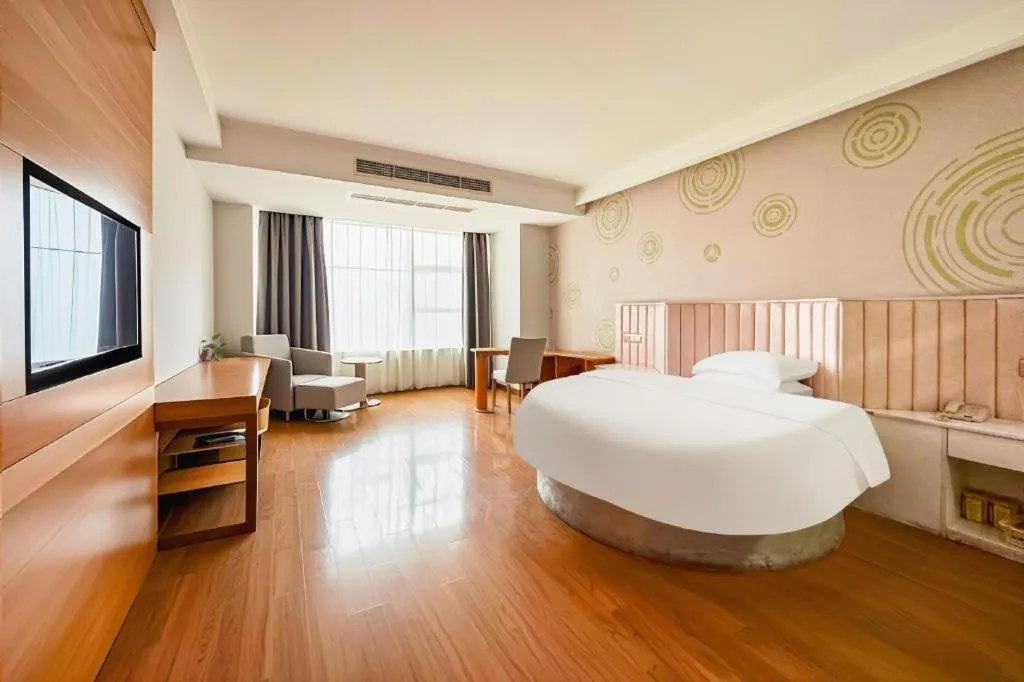 Bed in GreenTree Inn Ningbo Hangzhou Wan New District Lishi Square Business Hotel