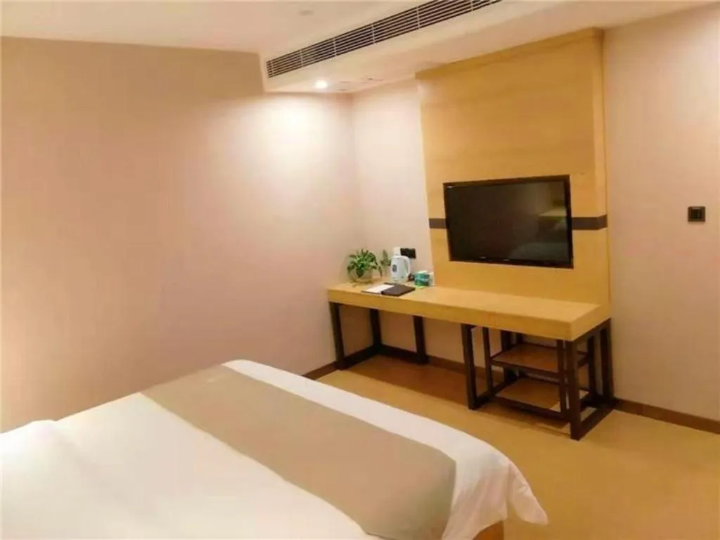 Bed in GreenTree Inn Ningbo Hangzhou Wan New District Lishi Square Business Hotel