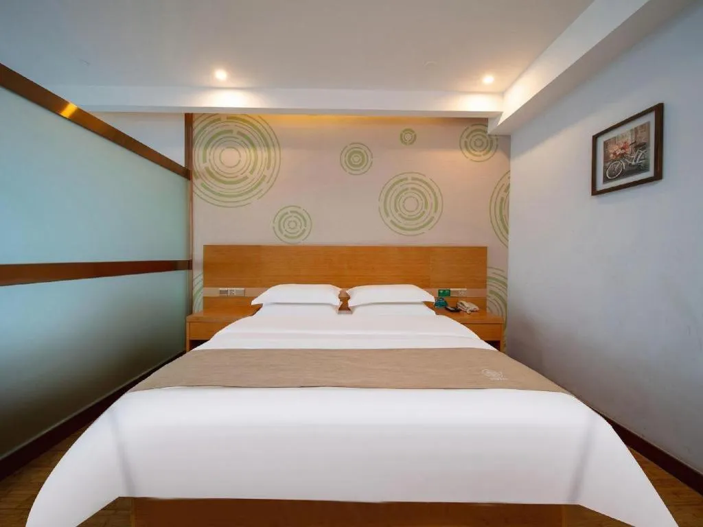 Bed in GreenTree Inn Ningbo Hangzhou Wan New District Lishi Square Business Hotel