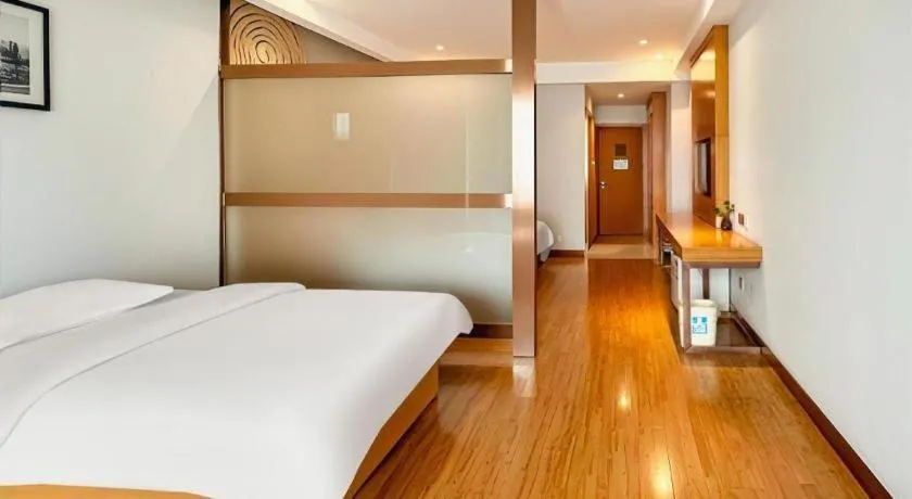 Bed in GreenTree Inn Ningbo Hangzhou Wan New District Lishi Square Business Hotel