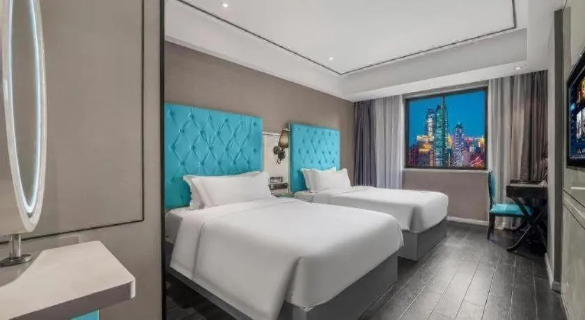 Bed in Xana Hotelle Chongqing Jiefangbei Center Branch