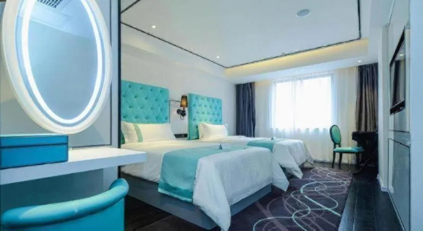 Bed in Xana Hotelle Chongqing Jiefangbei Center Branch