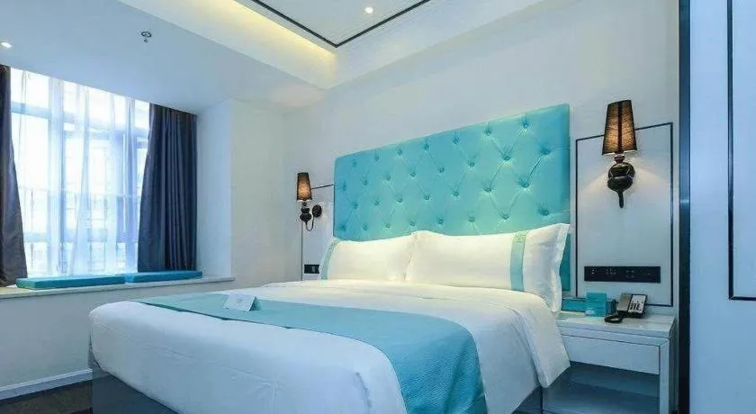 Bed in Xana Hotelle Chongqing Jiefangbei Center Branch