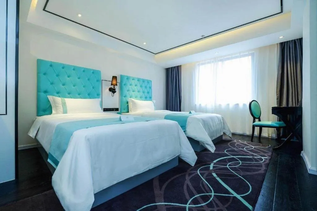 Bed in Xana Hotelle Chongqing Jiefangbei Center Branch