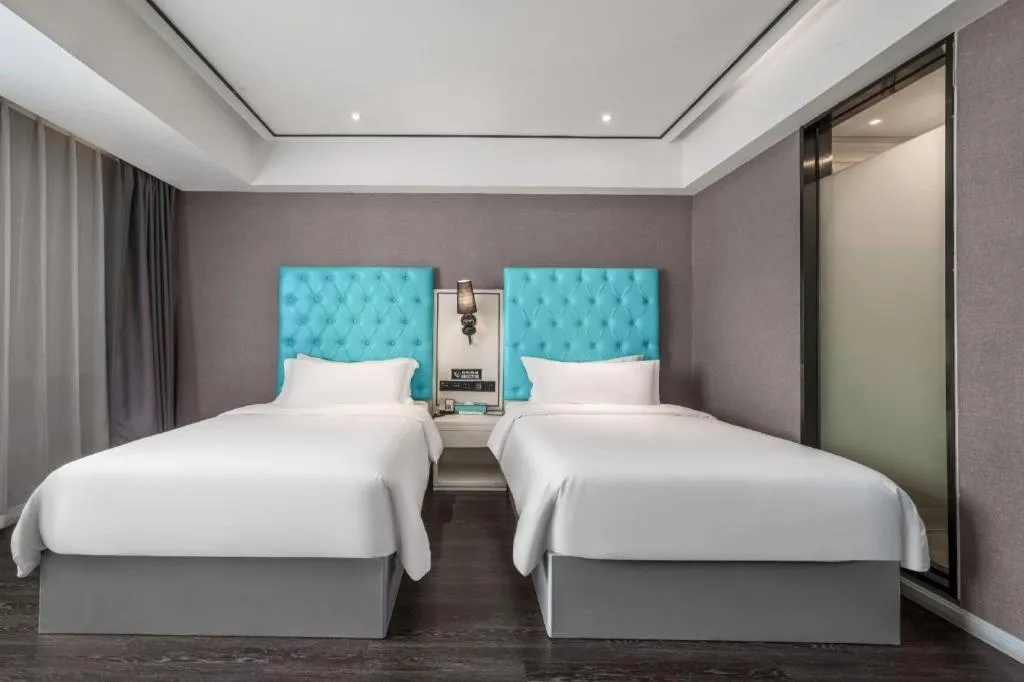 Bed in Xana Hotelle Chongqing Jiefangbei Center Branch
