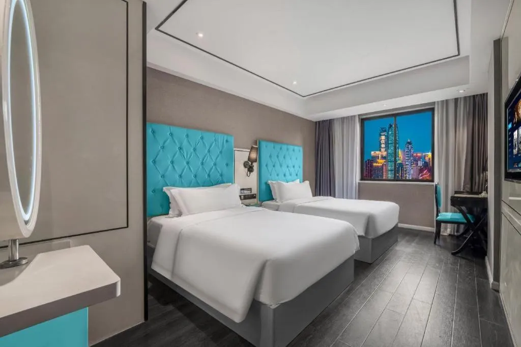 Bed in Xana Hotelle Chongqing Jiefangbei Center Branch