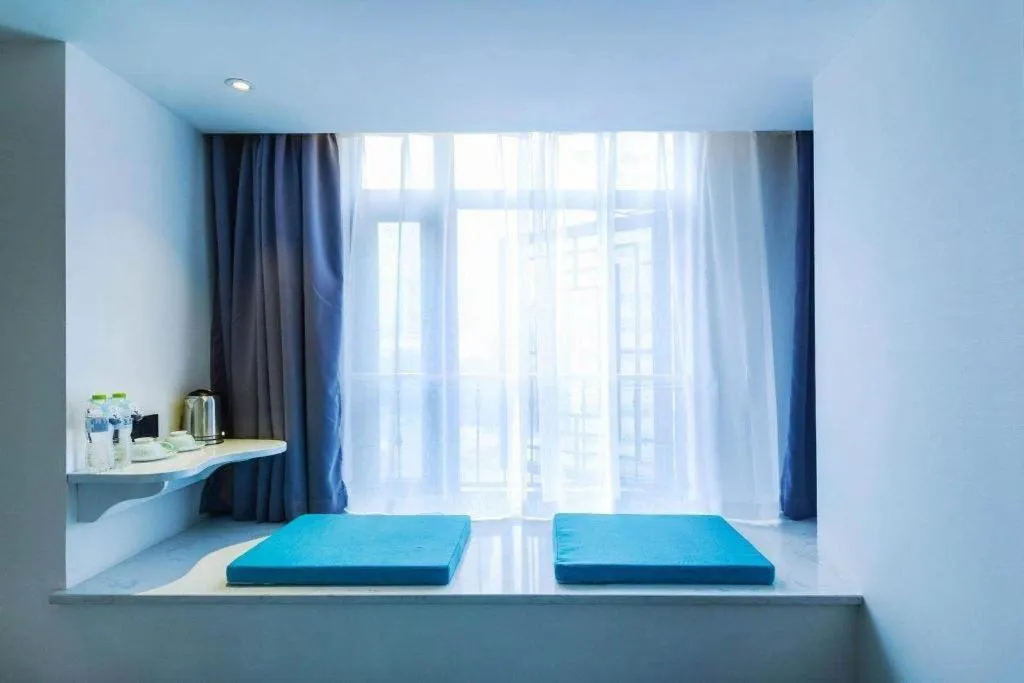 Bed in Xana Hotelle Chongqing Jiefangbei Center Branch