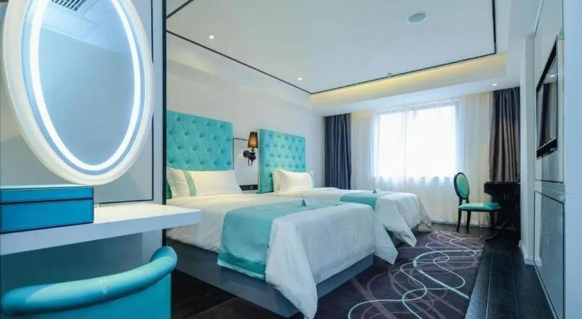 Bed in Xana Hotelle Chongqing Jiefangbei Center Branch