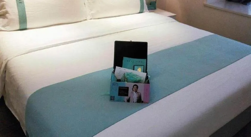 Bed in Xana Hotelle Chongqing Jiefangbei Center Branch