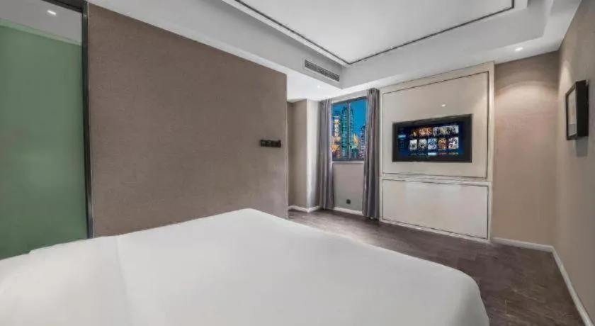 Bed in Xana Hotelle Chongqing Jiefangbei Center Branch