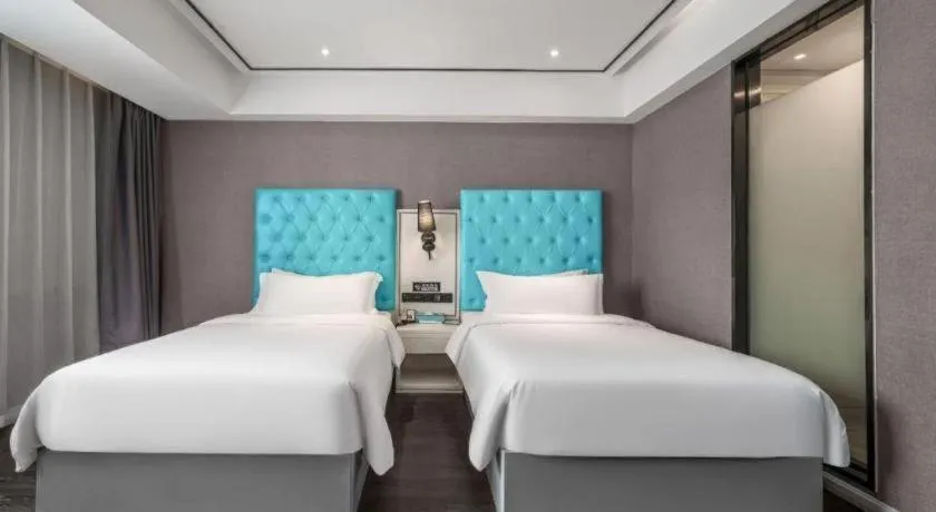 Bed in Xana Hotelle Chongqing Jiefangbei Center Branch