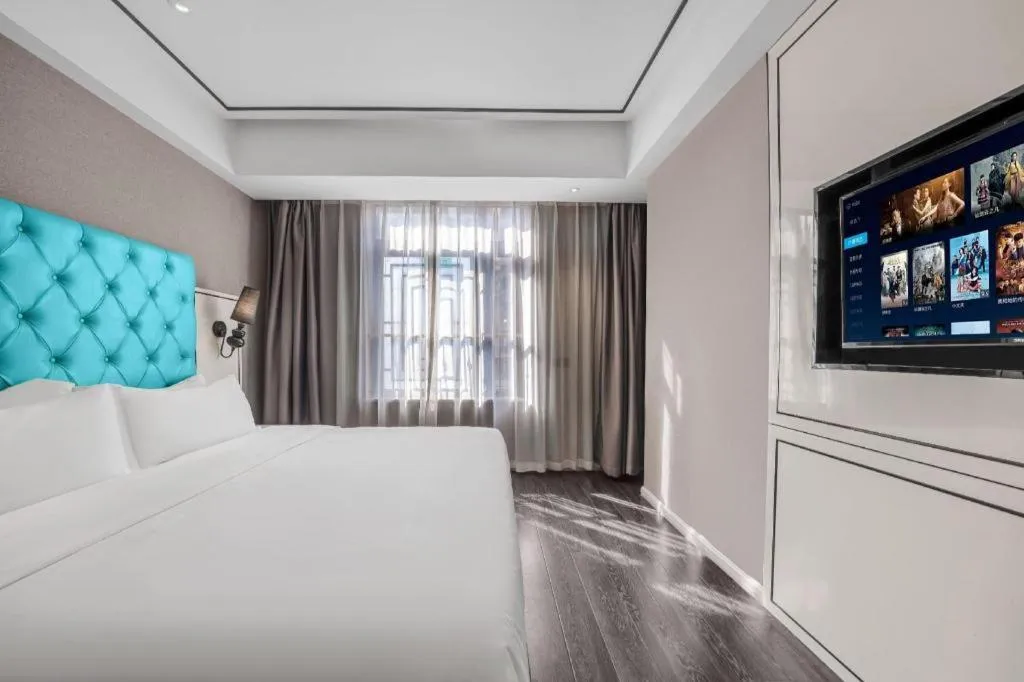 Bed in Xana Hotelle Chongqing Jiefangbei Center Branch