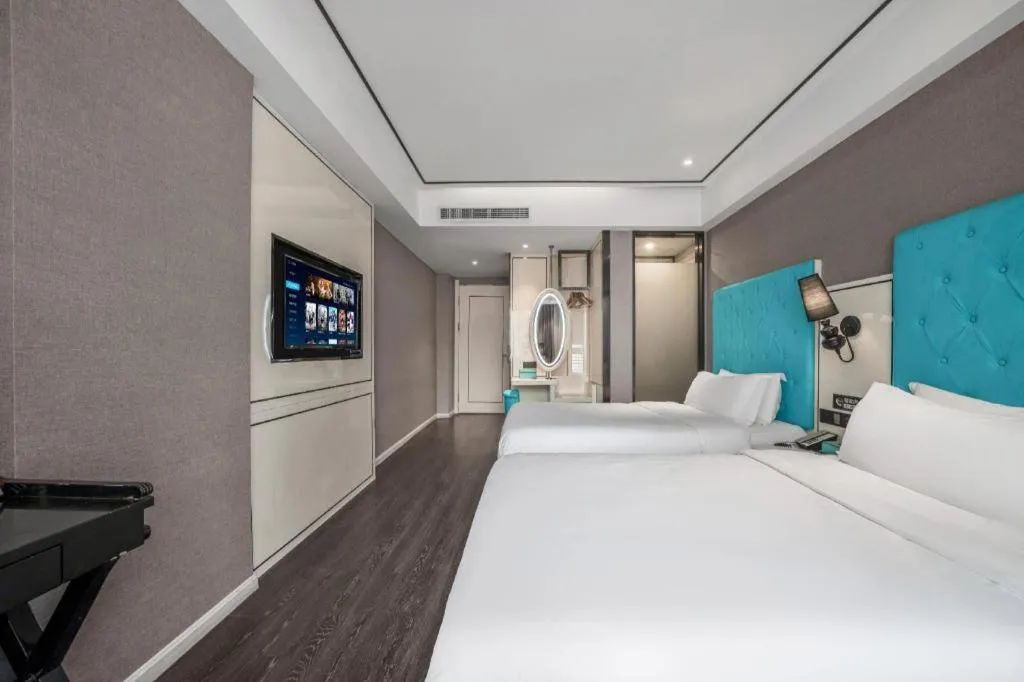 Bed in Xana Hotelle Chongqing Jiefangbei Center Branch