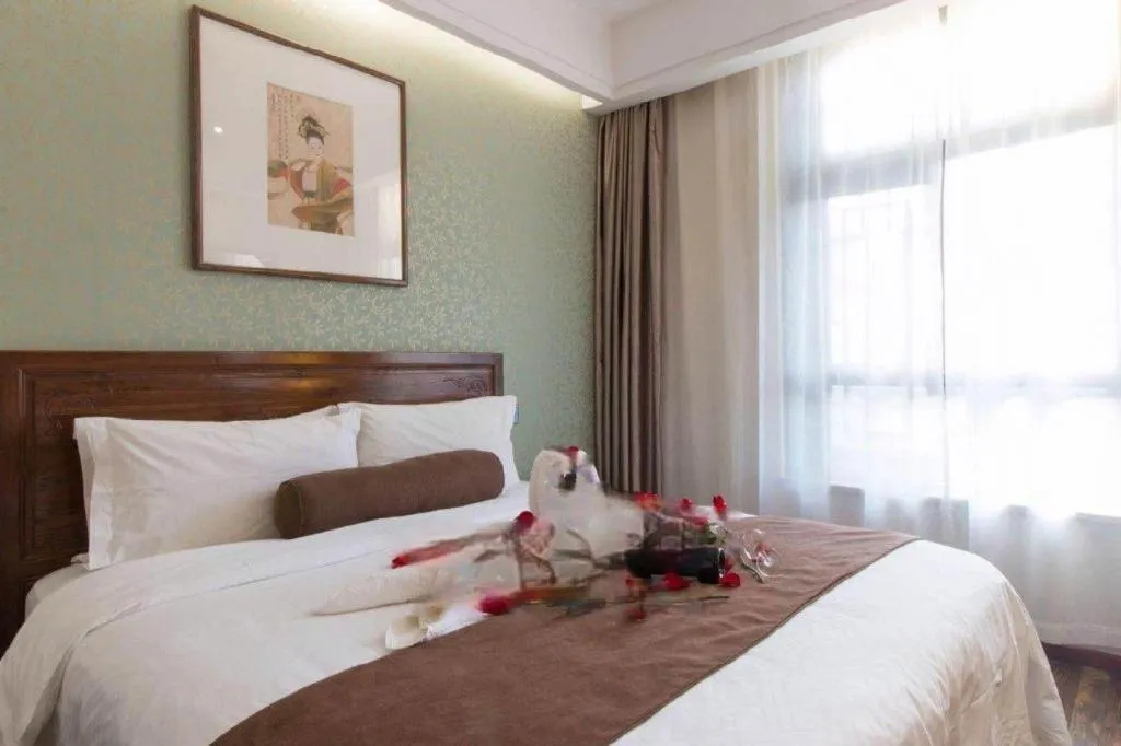 Bed in James Joyce Coffetel Xian Dayanta Metro Station Branch