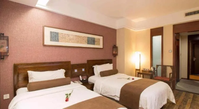 Bed in James Joyce Coffetel Xian Dayanta Metro Station Branch