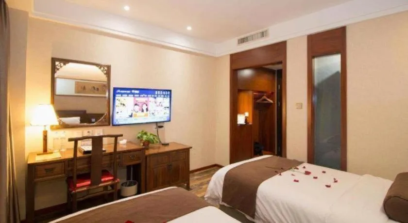 Bed in James Joyce Coffetel Xian Dayanta Metro Station Branch