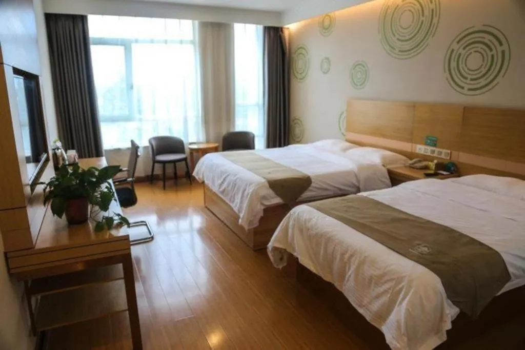 Bed in GreenTree Inn Shandong Heze Caoxian Zhuangzhai Town Oriental Times City Business Hotel