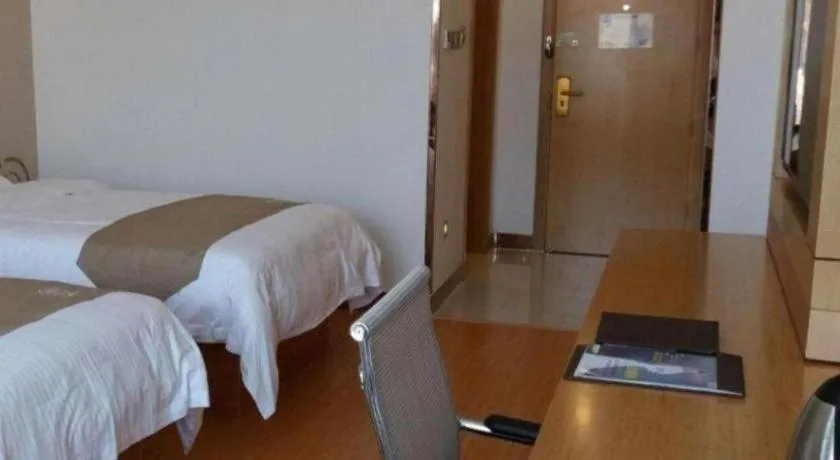 Bed in GreenTree Inn Shandong Heze Caoxian Zhuangzhai Town Oriental Times City Business Hotel