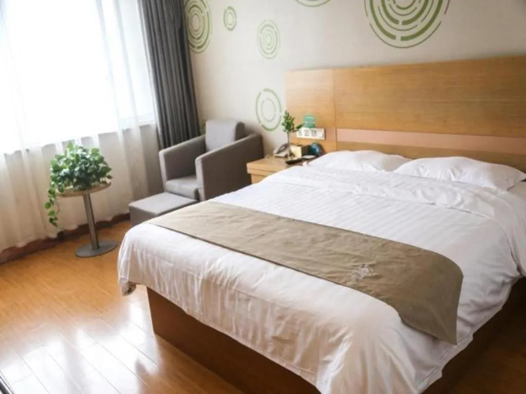 Bed in GreenTree Inn Shandong Heze Caoxian Zhuangzhai Town Oriental Times City Business Hotel