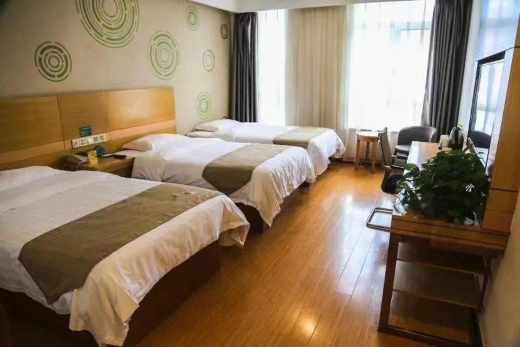 Bed in GreenTree Inn Shandong Heze Caoxian Zhuangzhai Town Oriental Times City Business Hotel