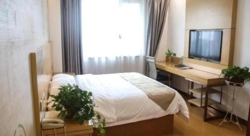 Bed in GreenTree Inn Shandong Heze Caoxian Zhuangzhai Town Oriental Times City Business Hotel