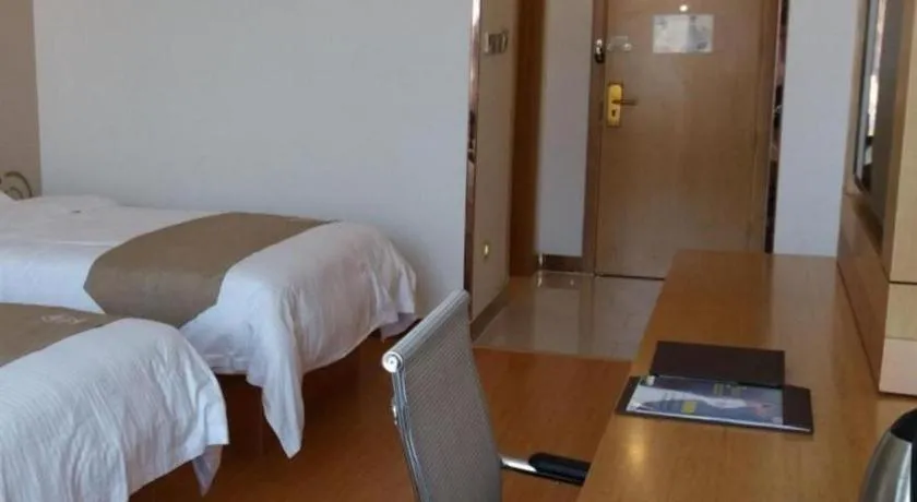 Bed in GreenTree Inn Shandong Heze Caoxian Zhuangzhai Town Oriental Times City Business Hotel