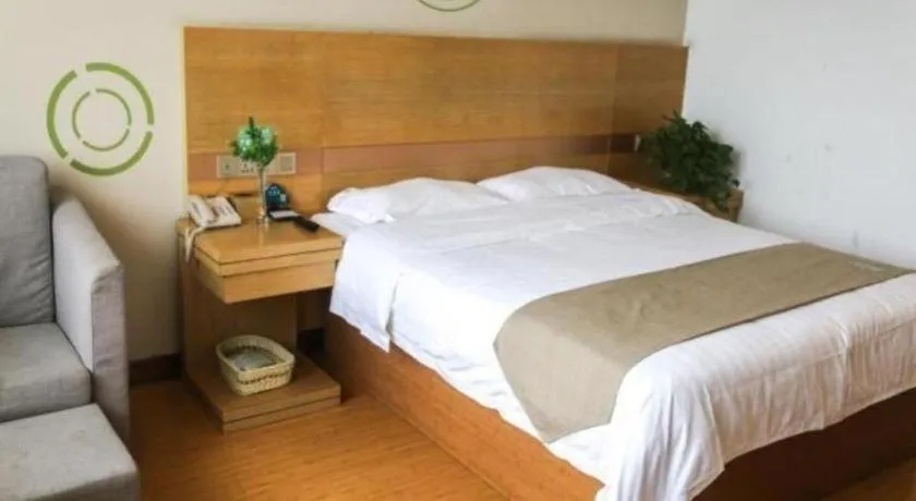 Bed in GreenTree Inn Shandong Heze Caoxian Zhuangzhai Town Oriental Times City Business Hotel