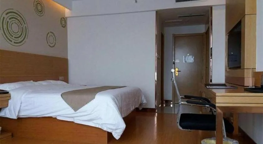 Bed in GreenTree Inn Shandong Heze Caoxian Zhuangzhai Town Oriental Times City Business Hotel