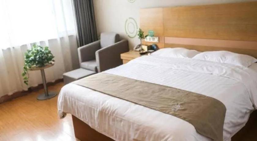 Bed in GreenTree Inn Shandong Heze Caoxian Zhuangzhai Town Oriental Times City Business Hotel