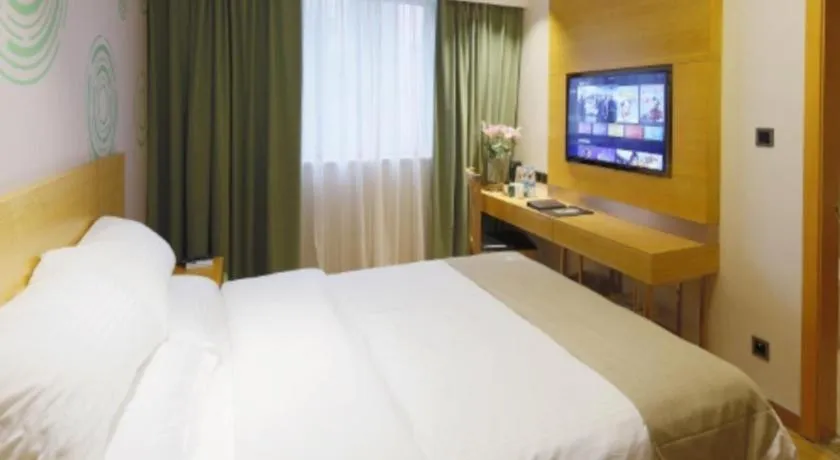 Bed in GreenTree Inn Shandong Heze Caoxian Zhuangzhai Town Oriental Times City Business Hotel