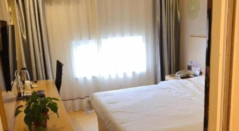 Bed in GreenTree Inn Binzhou Wudi County Yinzuo Plaza Express Hotel