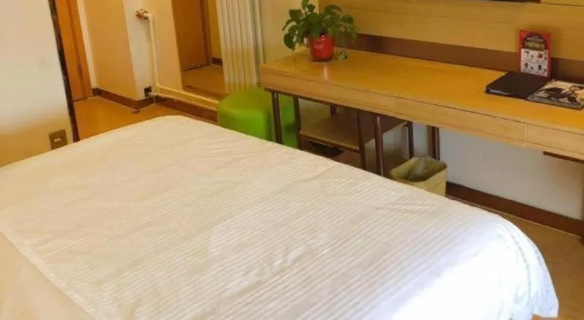 Bed in GreenTree Inn Binzhou Wudi County Yinzuo Plaza Express Hotel