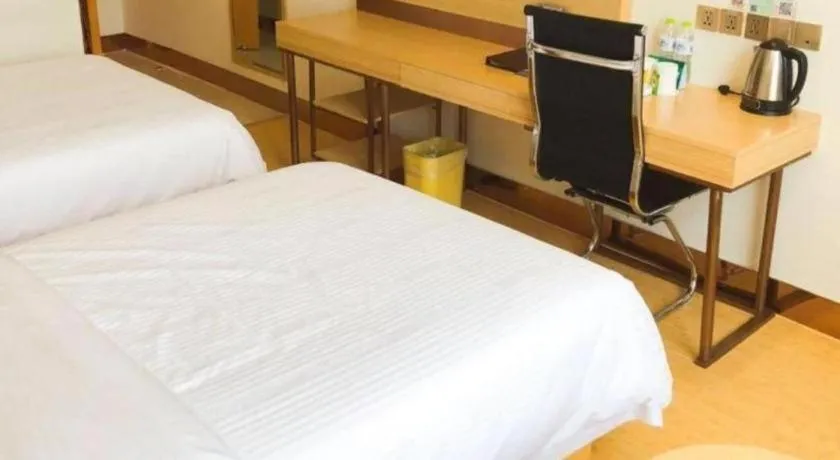 Bed in GreenTree Inn Binzhou Wudi County Yinzuo Plaza Express Hotel