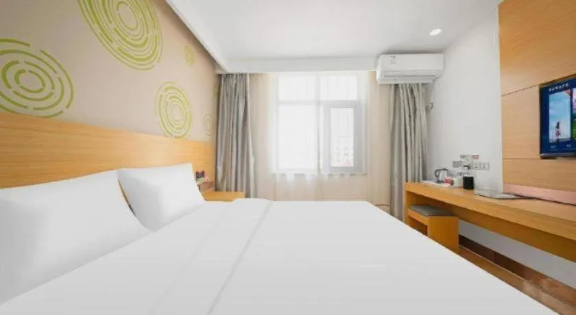 Bed in GreenTree Inn Binzhou Wudi County Yinzuo Plaza Express Hotel