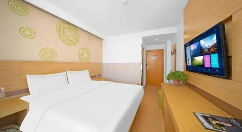 Bed in GreenTree Inn Binzhou Wudi County Yinzuo Plaza Express Hotel