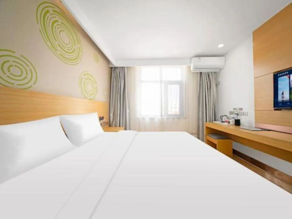 Bed in GreenTree Inn Binzhou Wudi County Yinzuo Plaza Express Hotel