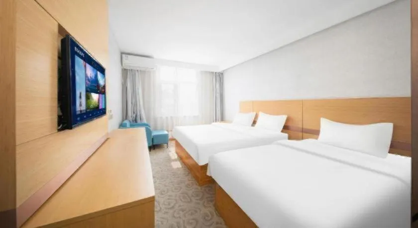 Bed in GreenTree Inn Binzhou Wudi County Yinzuo Plaza Express Hotel
