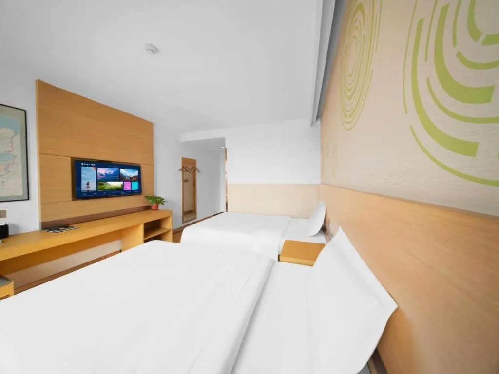 Bed in GreenTree Inn Binzhou Wudi County Yinzuo Plaza Express Hotel