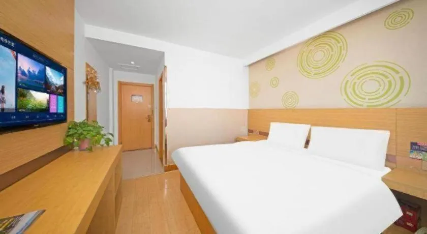 Bed in GreenTree Inn Binzhou Wudi County Yinzuo Plaza Express Hotel
